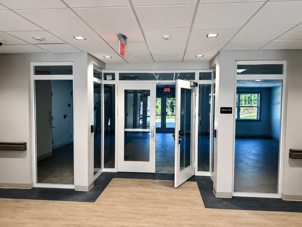 Aluminum storefront and entrance system installed by DSG Builders at Medford Gardens